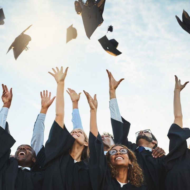 high school students getting graduated