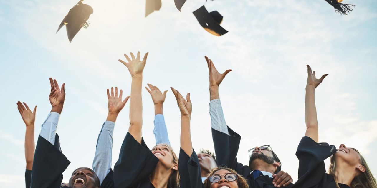 high school students getting graduated