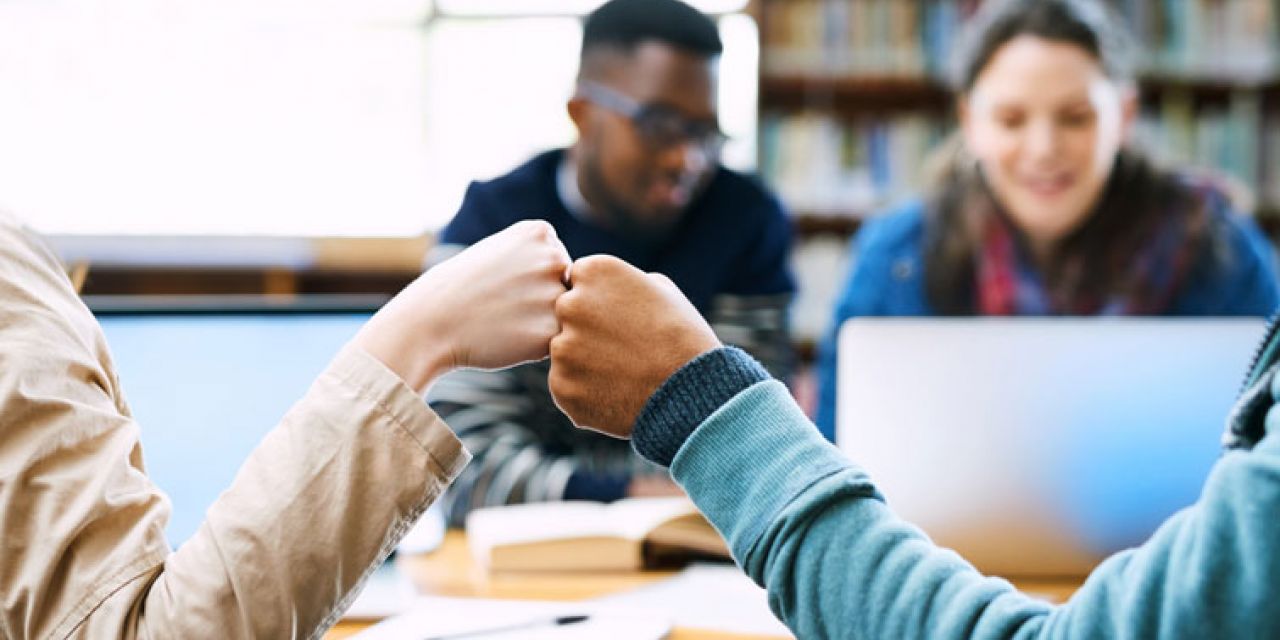 students supporting each other