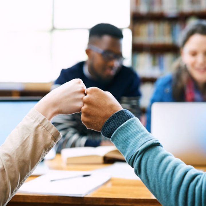 students supporting each other