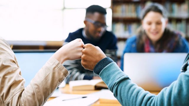 students supporting each other